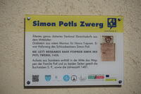 Informationstafel zur Marmorgrabplatte des Hanns Fudprem auf der Südmauer der Pfarrkirche