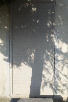 Grabstein des Michael Garzin auf der Ostseite der Pfarrkirche