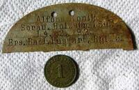A German Identification Tag of a Certain Alfons Konik and a German Coin found on the Mountain Visoka